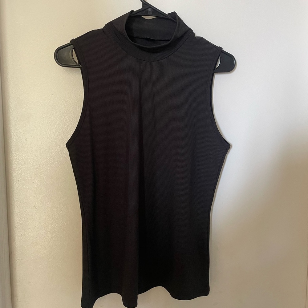 Black sleeve less high neck shirt